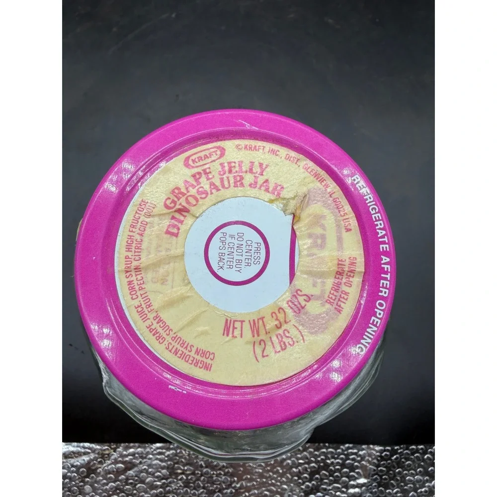 Vintage‎ Kraft Grape Jelly Dinosaur Jar Triceratops 32oz Glass Pink Lid 1980s